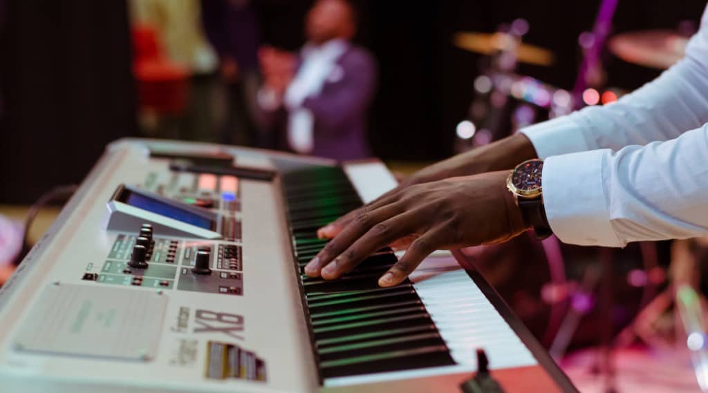 musician-keyboard-hands-play-live